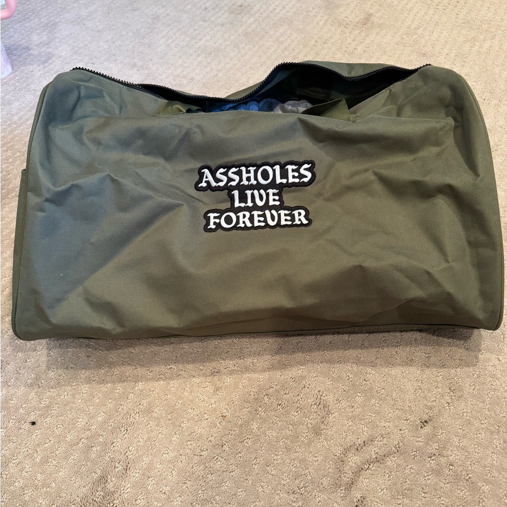 Assholes Live Forever Duffle bag